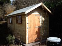 7 x 12 Workroom with a standard door and 2 standard windows.