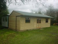 36 x 12 Cricket Pavilion, with a lined canopy. 2 large garage windows and georgian double doors. 