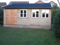 20 x 16 Workroom with cream office windows. Standard double doors and black onduline roof. 