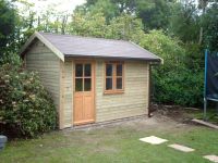 12 x 8 Workroom with felt tile roof, and a garden office door & window.