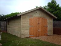 16 x 20 Workroom with large double doors. Standard window and a personal door. 