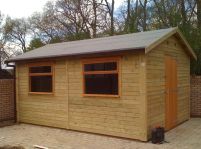 8 x 12 Workroom with 2 - large garage windows and a standard door. 