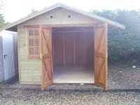 10 x 12 Leisure Room with framed double doors, 6 pane window & 2 x 9 pane windows.