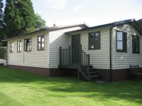 Garage and Workroom combined. Clad in feather edge, and painted in Protek Wood Protector.