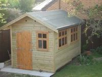 Single door and special windows on an 8ft x 12ft workroom.