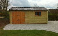 5m wide x 3m deep Garden Store with a brown Rollaclad roof. This was 2.5m high for planning reasons.