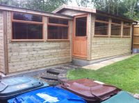 2 x Workrooms each with large garage windows and a glazed personal door. The 2 units are joined together.