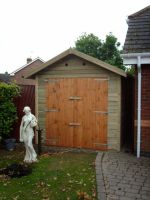 8 x 16 Workroom with Double Doors on front. This building featured a window & Personal Door in back wall. 