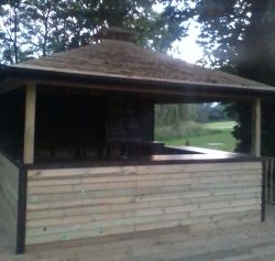 Point of Sale for Catering Hipped Roof with Cedar Shingles 