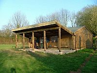 This is a bespoke design with add ons used to create an covered archery facility
