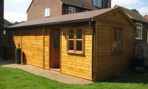 A customer design led Warwick Buildings Workroom with double glazed door and windows. This was eventually kitted out by the customer.